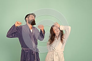 Advice relationships surviving quarantine. All day pajamas. Sleepy people blue background. Couple in love bathrobes