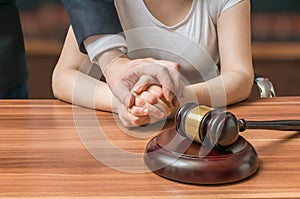 Advocate or lawyer defends accused innocent woman. Legal help and assistance concept photo