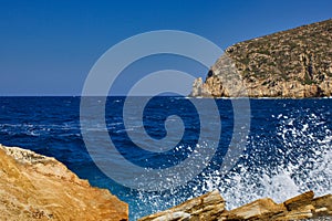 Aeagean Sea waves crashing on the rocks of Zeus Bay, Naxos, Greece