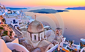 Aegean sea and Thira town at sundown