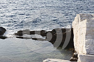 Aegean seashore and marble rocks in Aliki