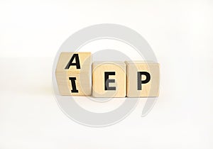 AEP or IEP symbol. Concept words AEP annual enrollment period IEP initial enrollment period. Beautiful white table white