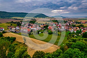 Aer ial view of a German village surrounded by meadows,