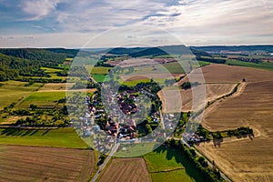 Aer ial view of a German village surrounded by meadows,