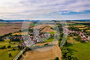 Aer ial view of a German village surrounded by meadows,