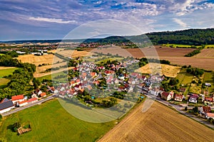 Aer ial view of a German village surrounded by meadows