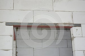 Aerated concrete blocks door way with metal lintel photo