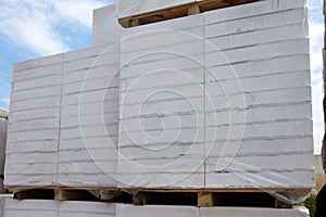 Aerated concrete blocks on pallets stored at warehouse