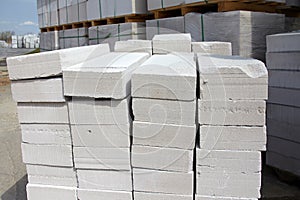 Aerated concrete blocks on pallets stored at warehouse