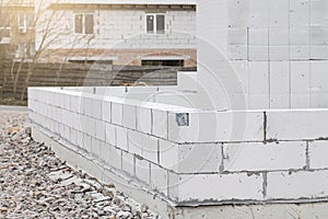 Aerated Concrete. Unfinished house wall made from aerated autoclaved concrete blocks