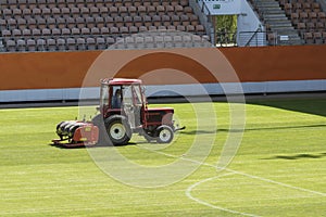 aerating a soccer pitch at the stadium