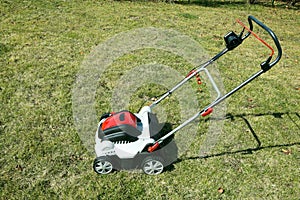 Aerator standing in grass.