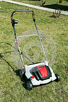 Aerator standing in grass.