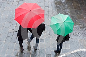 Aereal view of people holding colorful umbrellas