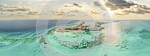 Aerial 360 panoramic view of Cancun beach and city hotel zone in Mexico at sunset. Caribbean coast landscape of Mexican