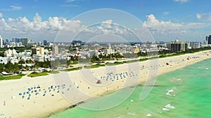 Aerial 4k 60p Miami Beach summer scene ocean and sand