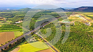 AERIAL 4K: Flight over Lavender Field. Sunset or sunrise aerial landscape of endless sunlit lavender fields. Plateau du