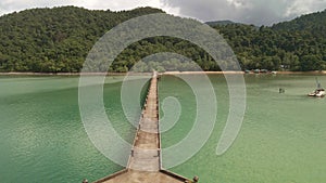 Aerial 4K footage of a long concrete pier in Koh Chang Thailand