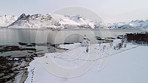 Aerial 4k video footage over Norway fjords in Lofoten , winter time on the polar circle