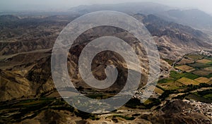 Aerial airplane panoramic view to Nazca plateau with geoglyph lines , Ica, Peru