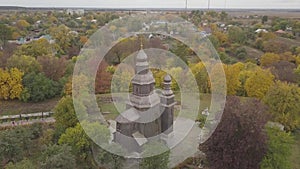 Aerial ancient wooden Cossacks St George Church in Ukrainian village Sedniv near Chernihiv