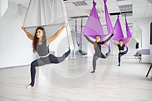 Aerial or antigravity yoga, training on hammocks