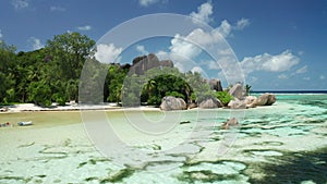 Aerial arc shot around Anse Source d`Argent beach, La Digue Seychelles