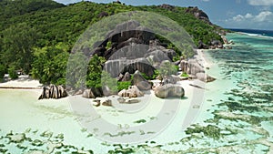 Aerial arc shot around most beautiful beach in the world, La Digue