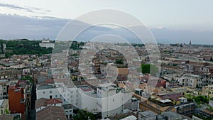 Aerial ascending footage of landmarks in historic city center. Several churches and basilicas, old houses and famous