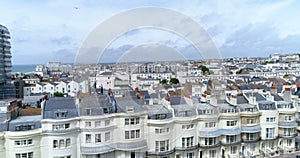 Aerial ascending view of the town of Brighton and Hove from a regency square