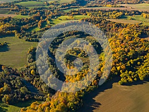 Aerial autumn landscape with colorful maple trees