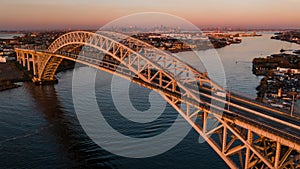 Aerial of Bayonne Steel Arch Bridge + Manhattan - Kill Van Kull - Bayonne, New Jersey and Staten Island, New York City, New York