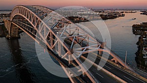 Aerial of Bayonne Steel Arch Bridge + Manhattan - Kill Van Kull - Bayonne, New Jersey and Staten Island, New York City, New York