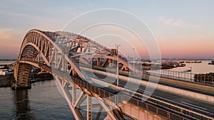 Aerial of Bayonne Steel Arch Bridge + Manhattan - Kill Van Kull - Bayonne, New Jersey and Staten Island, New York City, New York