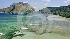 Aerial beach reveal footage on tropical coast at Anse Forbans. Mahe Island, Seychelles