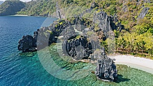 Aerial beach reveal footage on tropical coast at Anse Forbans. Mahe Island, Seychelles