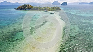 Aerial beach reveal footage on tropical coast at Anse Forbans. Mahe Island, Seychelles