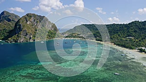 Aerial beach reveal footage on tropical coast at Anse Forbans. Mahe Island, Seychelles