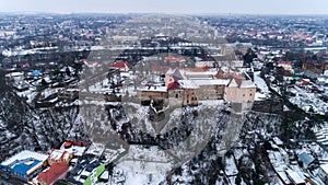 Aerial beatiful grimly view on Uzhhorod Castle in winter.