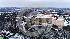 Aerial beatiful grimly view on Uzhhorod Castle in winter.