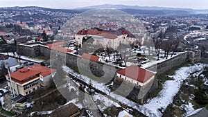 Aerial beatiful grimly view on Uzhhorod Castle in winter.