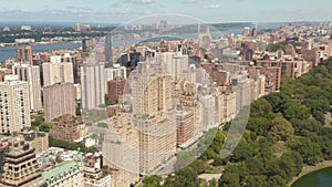 AERIAL: Beautiful New York City Buildings with Central Park at sunny summer day