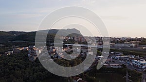 Aerial beautiful view. Evening sunset, Italy city, rooftops, City traffic, aerial panorama 4k