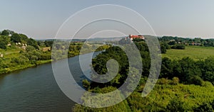 Aerial Beautiful View Landscape of City and River and Church on a small hill.