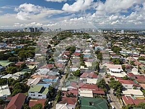 Aerial of BF Paranaque, and Alabang skyline in background. It is the largest subdivision in Asia.