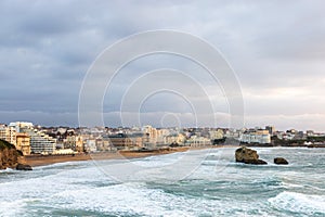An aerial of Biarritz city at sunset from the ocean. Biarritz, France photo