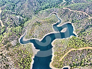 Aerial bird's eye drone view of water Lefkara reservoir river lake Cyprus