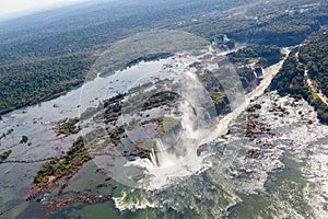 Aerial bird's-eye view panorama of Iguazu Falls from above, from a helicopter. Border of Brazil and Argentina. Iguassu,