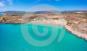 Aerial birds eye view drone photo Agia Agathi beach near Feraklos castle on Rhodes island, Dodecanese, Greece. Panorama with sand
