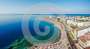 Aerial birds eye view drone photo of Elli beach on Rhodes city island, Dodecanese, Greece. Panorama with nice sand, lagoon and